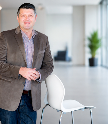 Portrait of Benji Perosin, Realtor®.